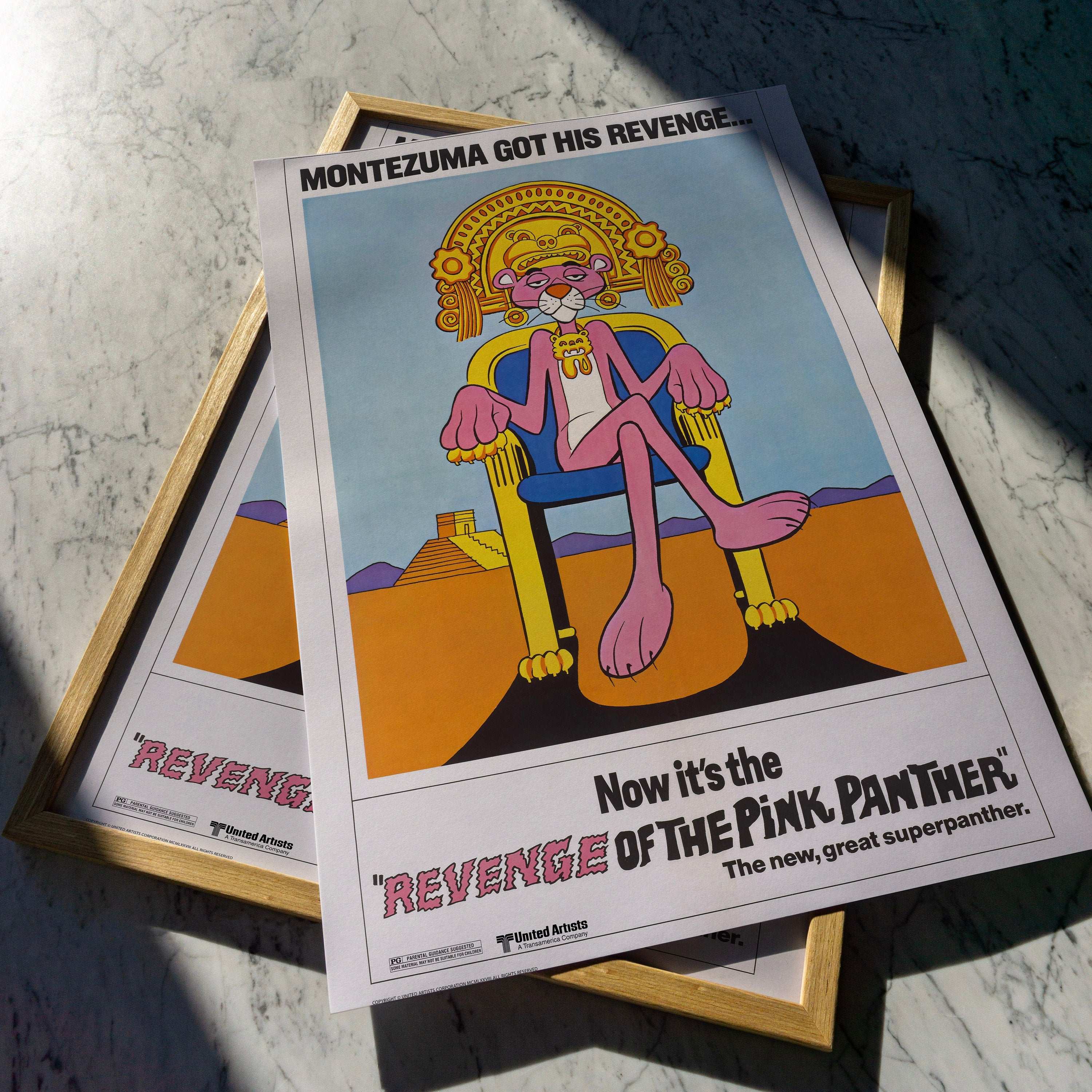 The poster features a close-up of the Pink Panther&#39;s face, with a determined expression. He is wearing his signature pink hat and scarf. The text at the top of the poster reads MONTEZUMA GOT HIS REVENGE.